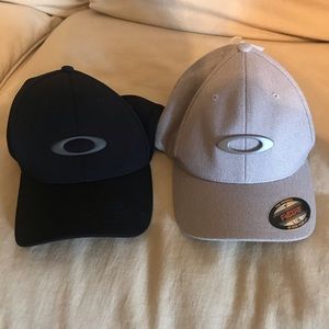 Two Oakley hats